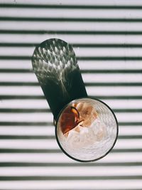 Directly above of iced tea in glass