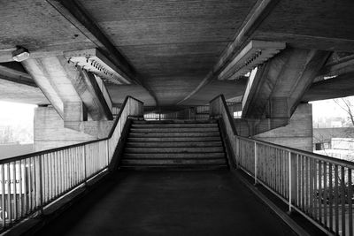 View of staircase under a bridge