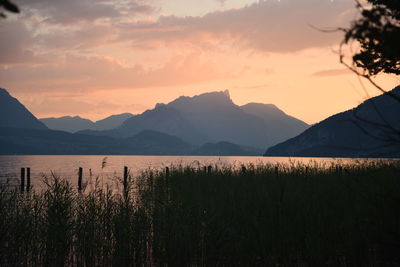 Scenic view of silhouette mountains against sky during sunset