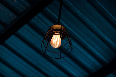 Low angle view of illuminated pendant light