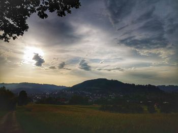 Scenic view of landscape against sky during sunset