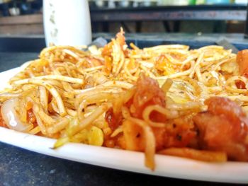 Close-up of noodles served in plate on table
