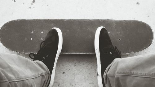 Low section of person wearing shoes