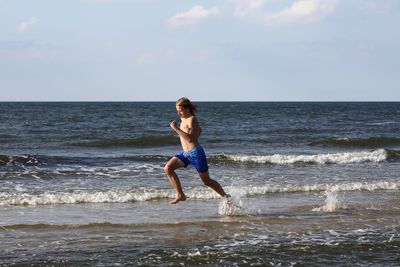 People walking on beach