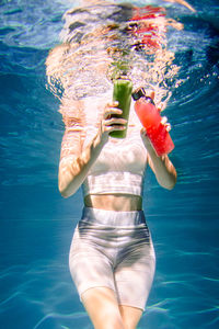 Woman swimming in pool