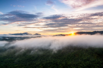 Scenic view of mountains against sky during sunset