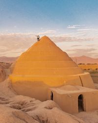 Scenic view of desert against sky