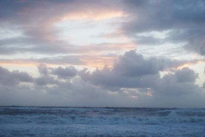 Scenic view of sea against dramatic sky