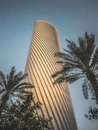 Low angle view of skyscraper against clear sky