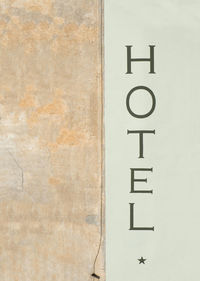 Close-up of text on wall