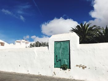 White building against blue sky