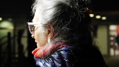 Close-up of senior woman wearing warm clothing