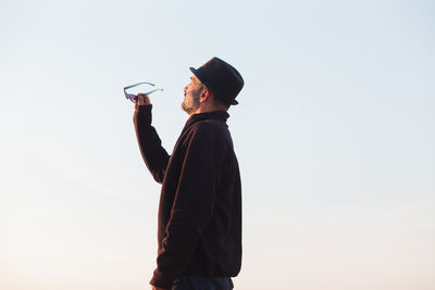 Man standing against clear sky