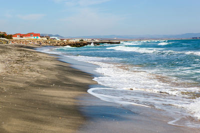 Scenic view of beach against sky