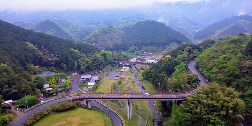 High angle view of bridge in city against sky