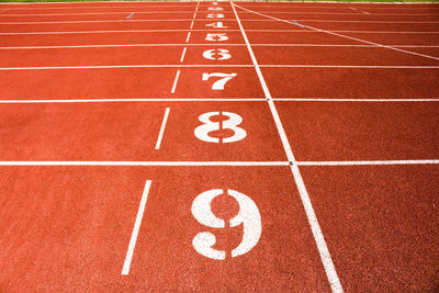 High angle view of numbers on running track