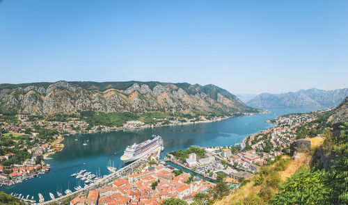 High angle view of river with mountain range in background