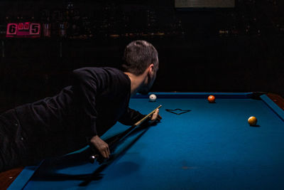 Man playing pool