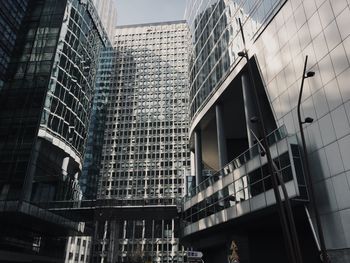 Low angle view of modern buildings in city