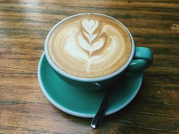 Close-up of cappuccino on table