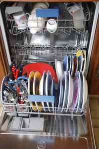 Close-up of shopping carts in kitchen at home