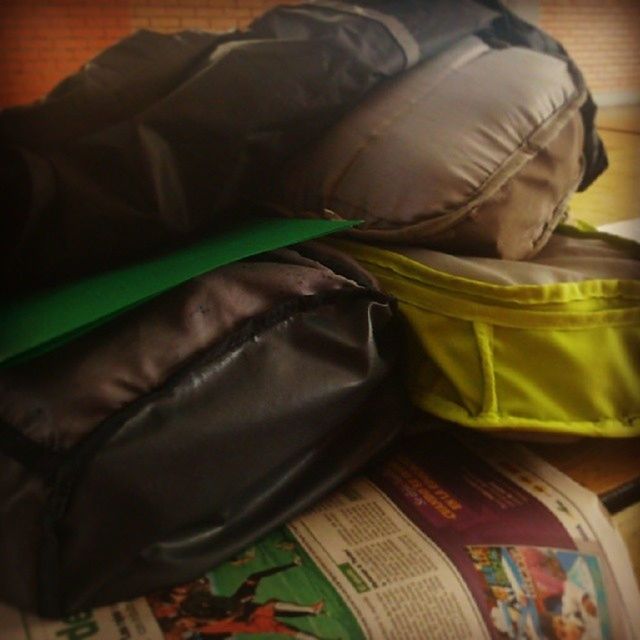 indoors, still life, close-up, shoe, table, high angle view, no people, car, land vehicle, pair, sofa, leather, bag, mode of transport, day, footwear, absence, two objects, home interior, book