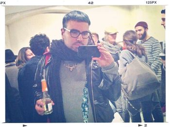 Friends with arms raised