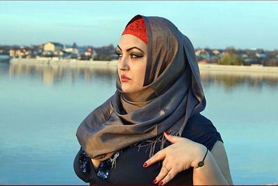 Close-up of young woman in water