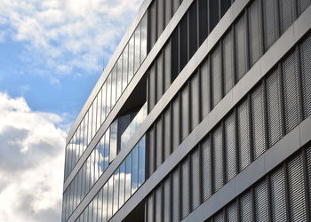 Low angle view of modern building against sky