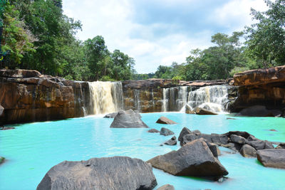 View of waterfall in swimming pool