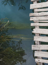 High angle view of pier over lake against sky