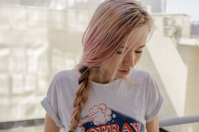 Close-up of young woman looking down