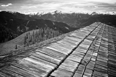 High angle view of snowcapped mountains against sky