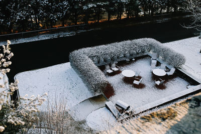 High angle view of snow on railing during winter