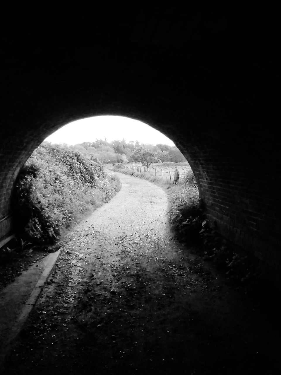 ARCH BRIDGE IN TUNNEL SEEN THROUGH ARCHWAY