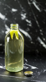 Close-up of drink in glass jar on table