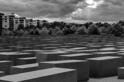 View of cemetery against cloudy sky