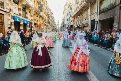 Group of people on street in city