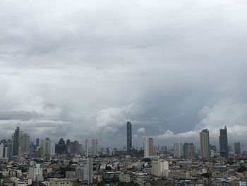 Modern buildings in city against sky