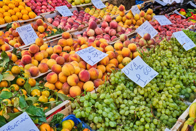 Peaches, grapes and other fruits for sale at market