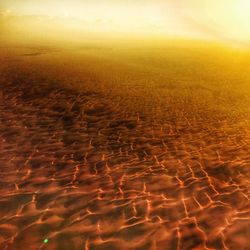Aerial view of landscape during sunset
