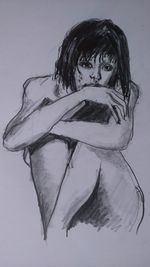 Close-up of woman over white background