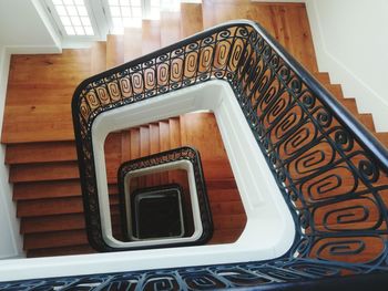 Directly below shot of spiral staircase of building