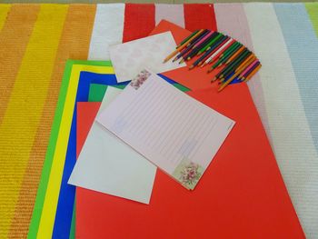 High angle view of multi colored pencils on table