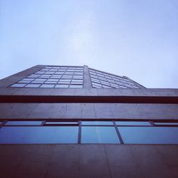 Low angle view of building against clear blue sky