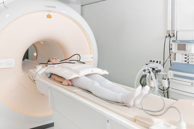 Medical ct or mri scan with a patient in the modern hospital laboratory. interior of radiography