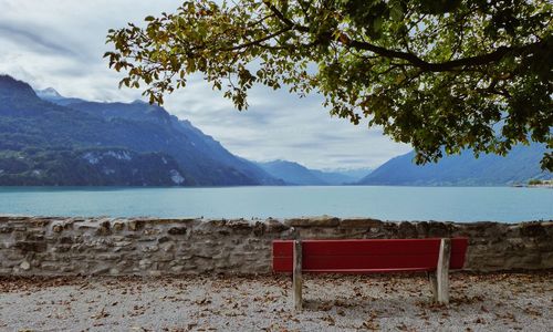 Scenic view of lake with mountains in background