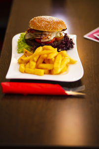 Close-up of burger in plate on table