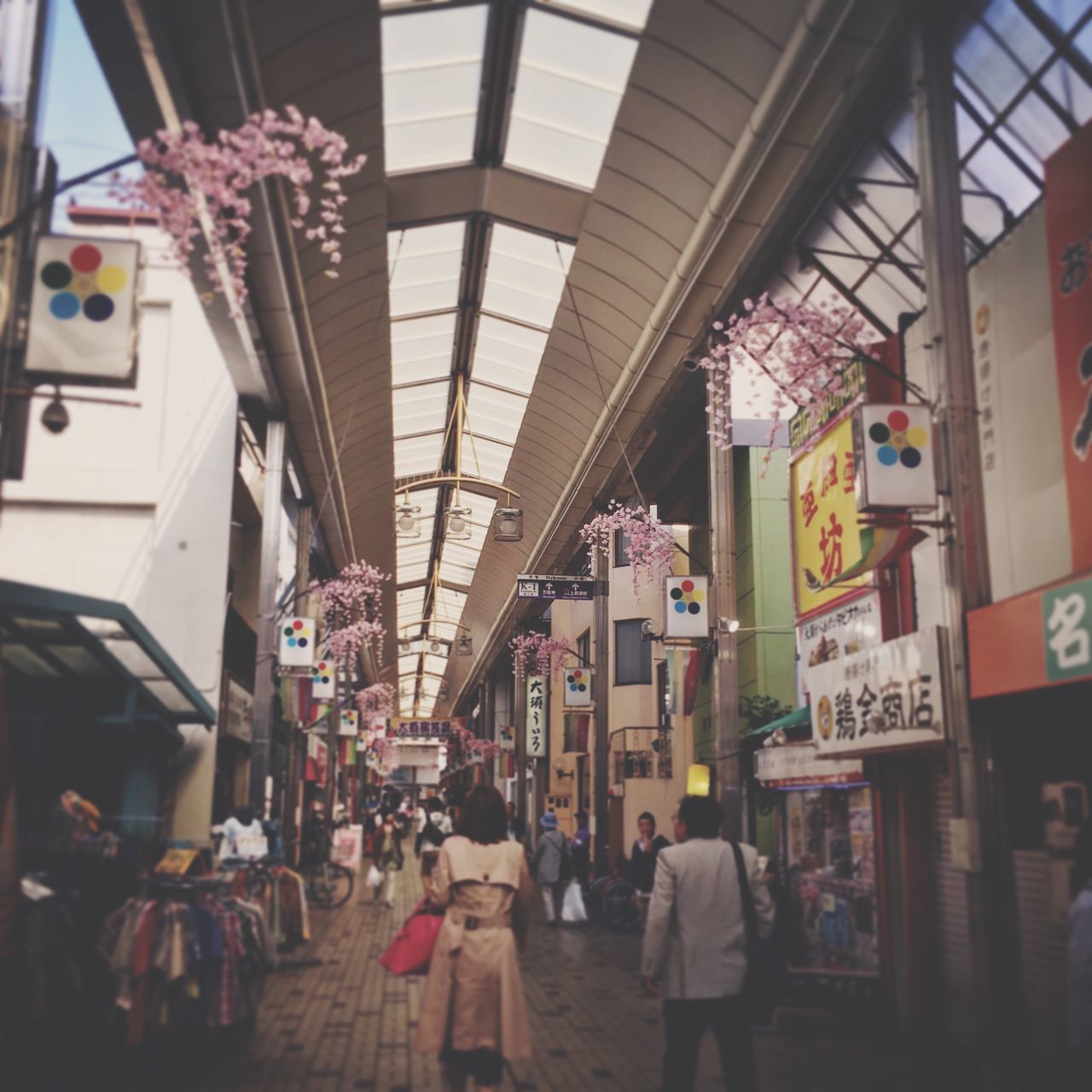 architecture, built structure, real people, indoors, hanging, market, women, large group of people, city, day, people