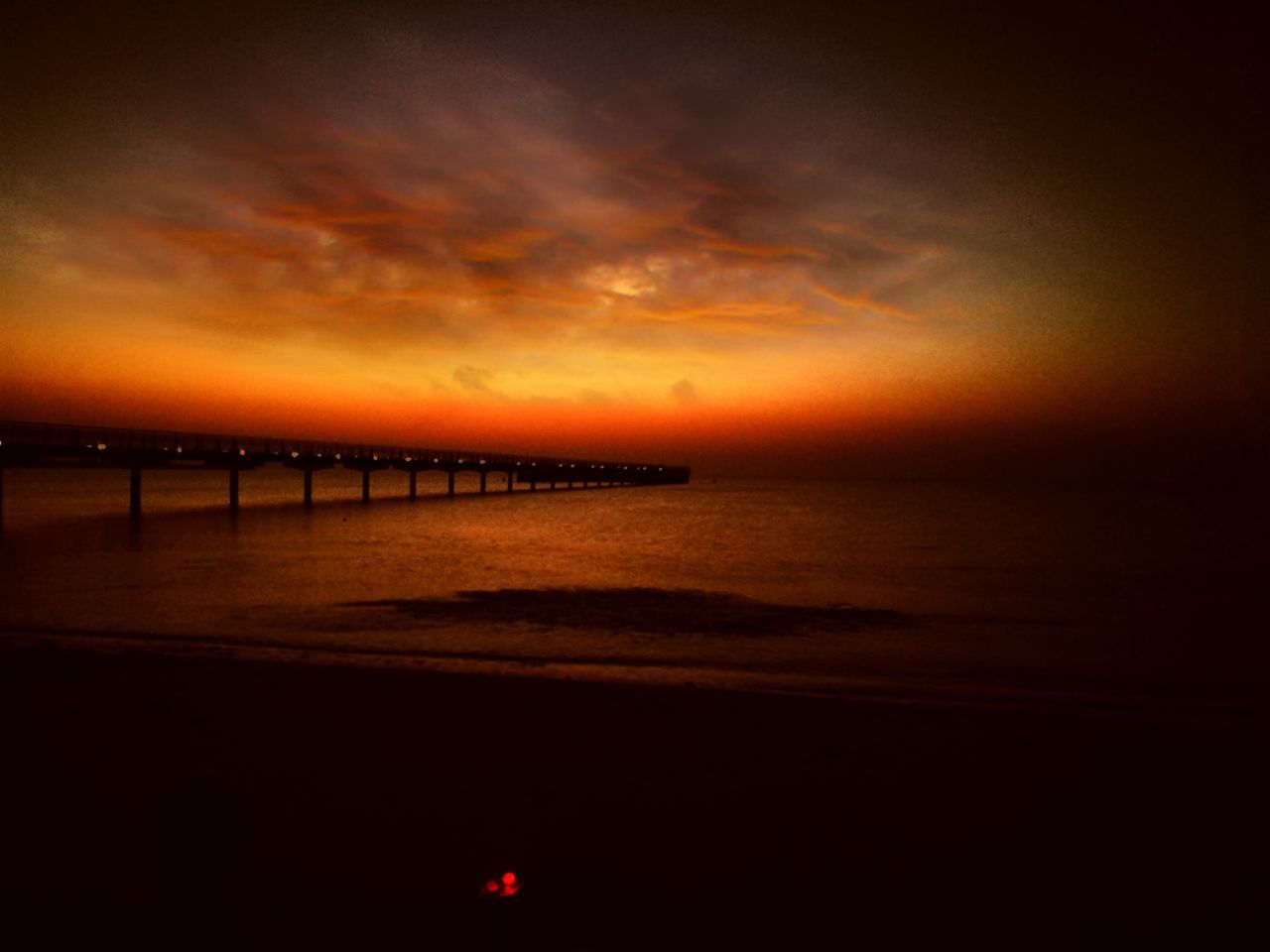 sunset, sea, water, horizon over water, scenics, tranquil scene, sky, beauty in nature, tranquility, orange color, idyllic, nature, cloud - sky, shore, dramatic sky, calm, cloud, outdoors, ocean, no people, remote, dark, sun, non-urban scene, cloudy, majestic